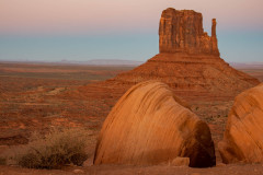 Photo of one of the Mittens in Monument Valley at Sunset.
