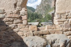 Photo of a Natural Spring and Mountains in Ollantaytambo Fortress in the Sacred Valley, Peru