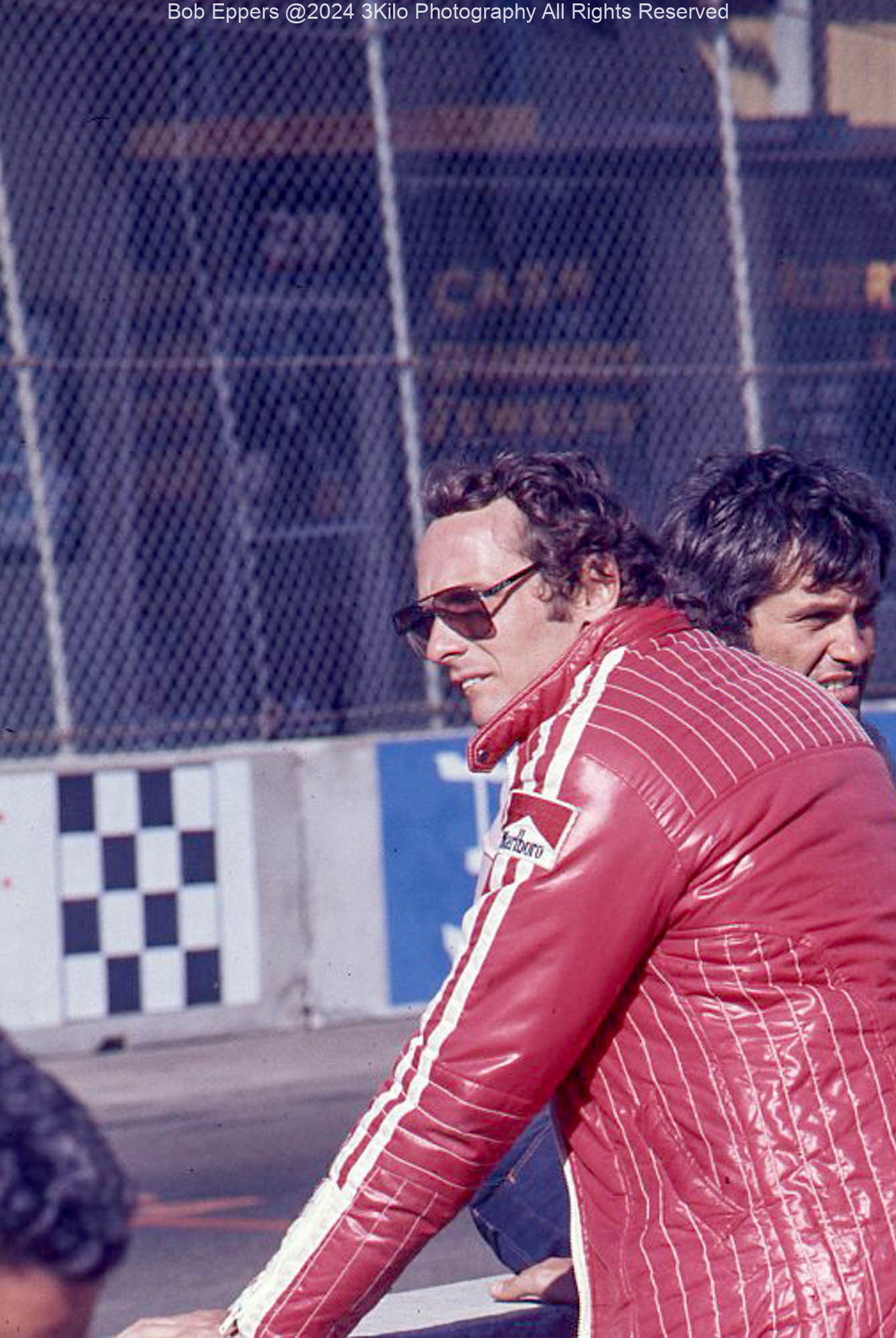 Photo of Niki Lauda in the pit lane.  1976