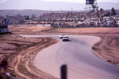 Photo of a NASCAR race at Riverside, CA.  Coming up the esses.