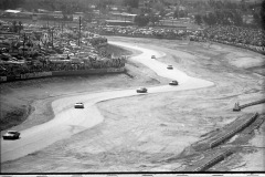Photo of cars going up the esses at a NASCAR Race at Riverside