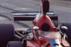 Photo of F5000 car in the pits at Riverside .  1975