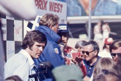 Photo of Winner Clay Regazzoni being interviewed by Dan Gurney.  1976