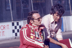 Photo of Niki Lauda in the pit lane.  1976